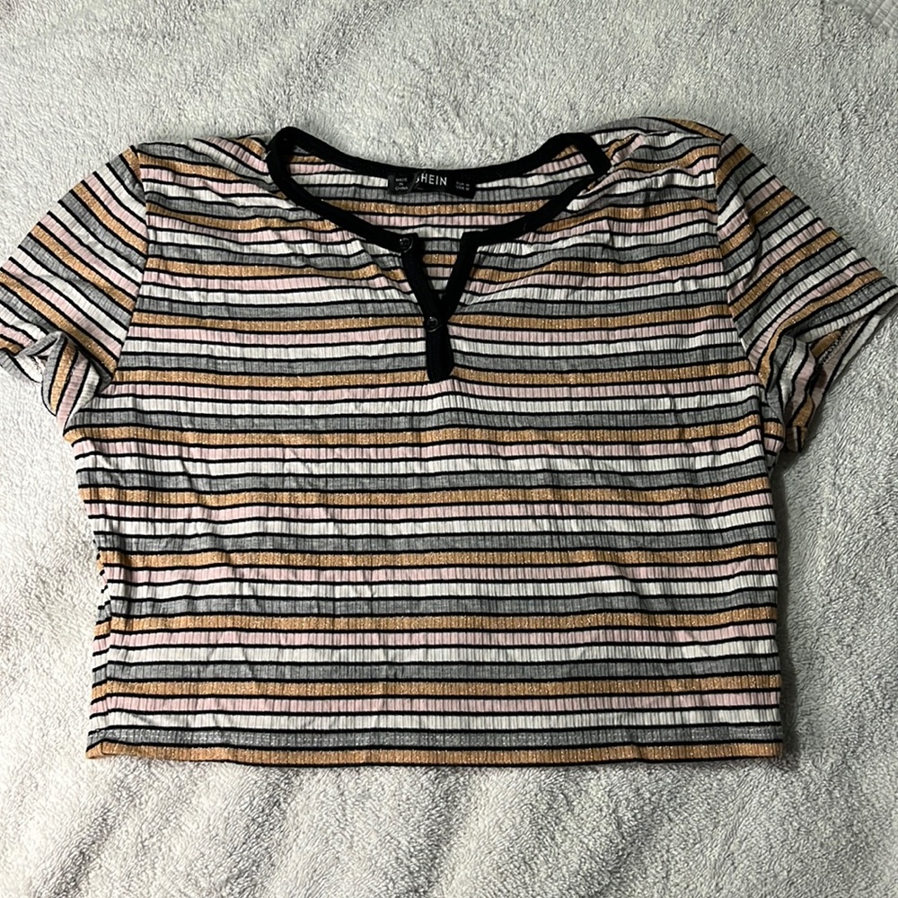 from SHEIN has a light pink,white,grey,and a sparkly gold
